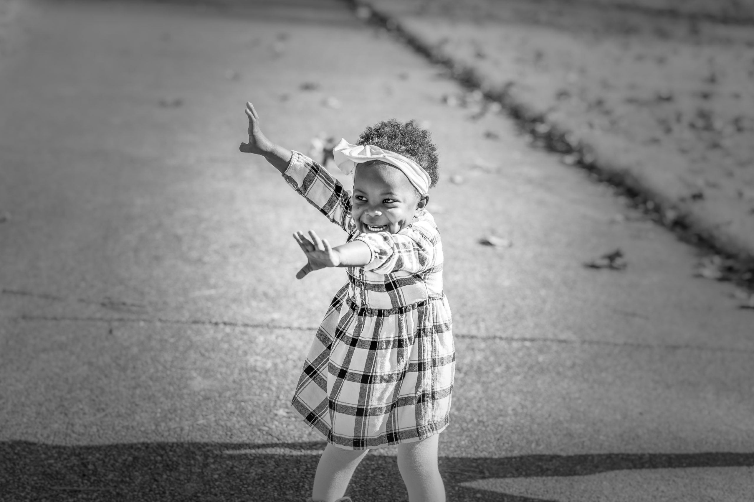 Young girl playing outside